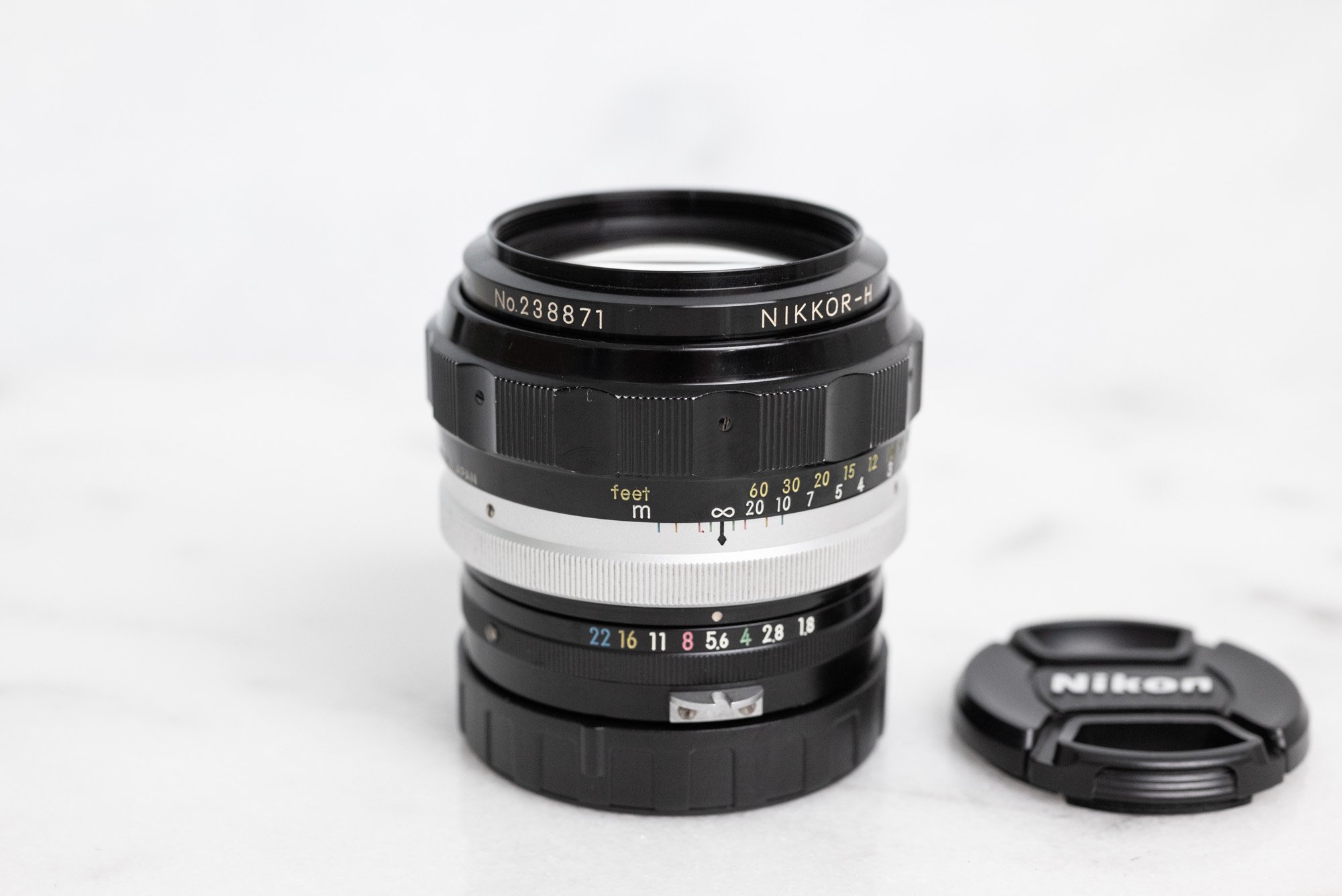 Nikon Nikkor H Auto 85mm F/1.8 Pre AI Fast Prime Lens with Nikon Nikkor H Auto 85mm F/1.8 Pre AI Fast Prime Lens with